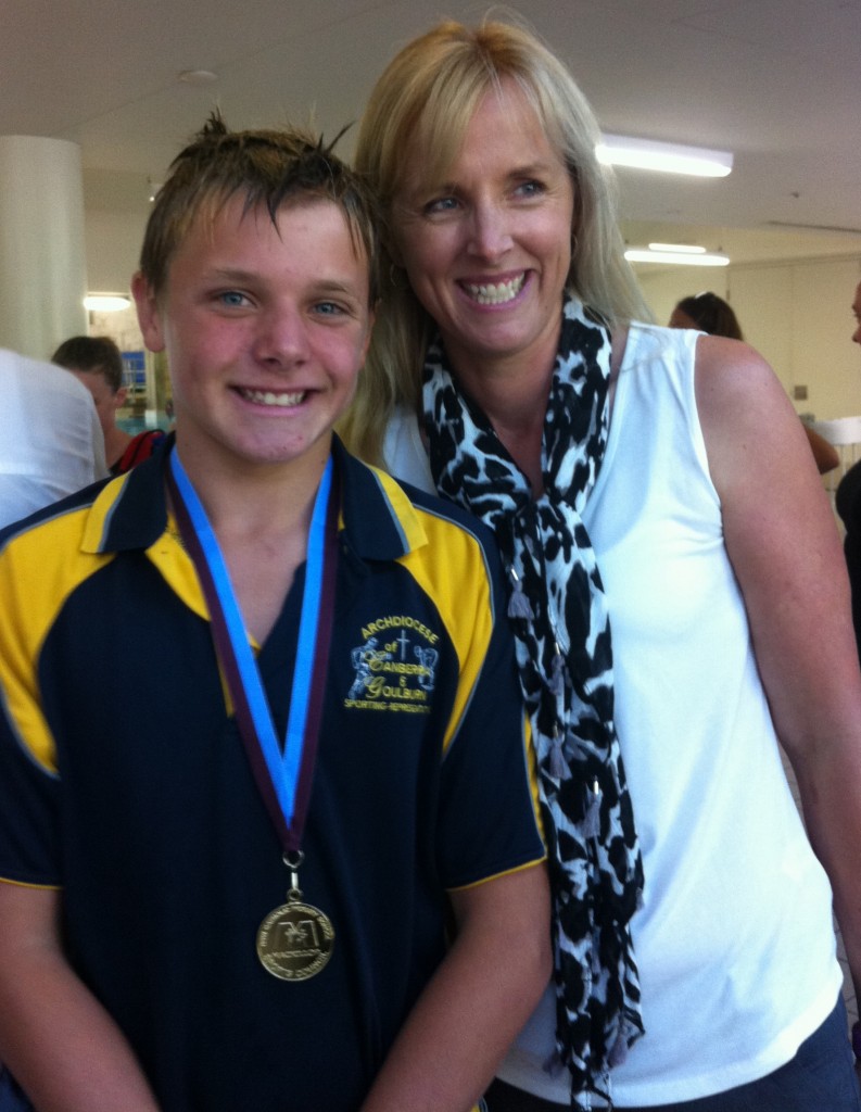 Thomas Carey with his mum Sue Carey after winning the gold in the 50m freestyle.